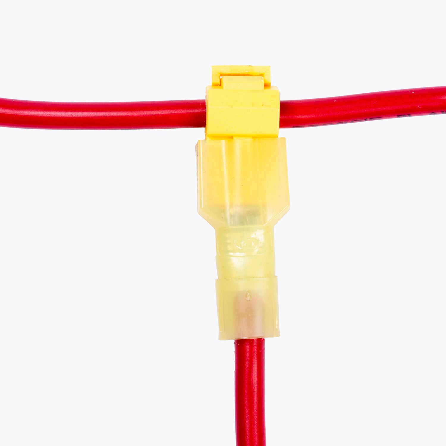 Take Off Connector 6mm Yellow (6 pack) attaching two red electrical wires for camping power and LED lighting solutions, ideal for outdoor 4x4 adventures.