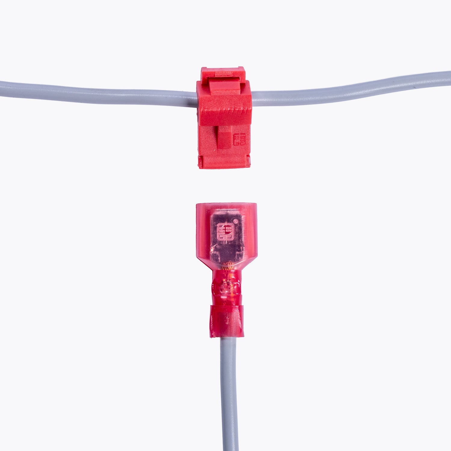 Take Off Connector 3mm Red (6 pack) shown connected to grey wiring, ideal for camping lights and power distribution in outdoor and 4x4 applications.