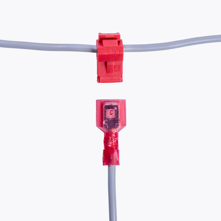 Take Off Connector 3mm Red (6 pack) shown connected to grey wiring, ideal for camping lights and power distribution in outdoor and 4x4 applications.